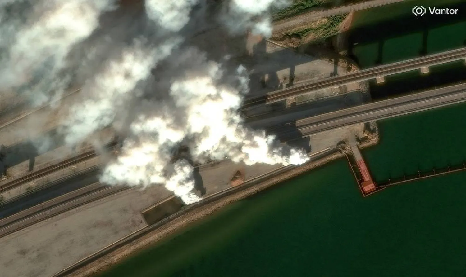 A satellite image shows smoke rising by the Crimea Bridge, amid the Russia-Ukraine conflict, Crimea, June 22, 2026.(Vantor/Handout via Reuters)