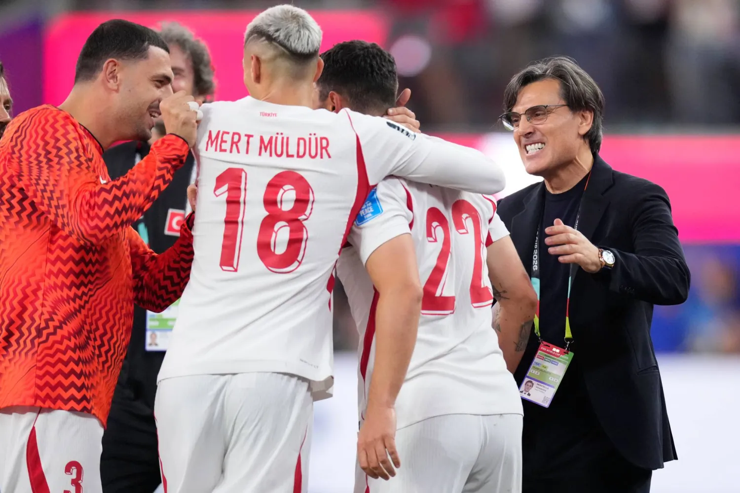Türkiye head coach Vincenzo Montella congratulates Kaan Ayhan at the end of the World Cup Group D soccer match against the United States in Inglewood, Calif., near Los Angeles, Thursday, June 25, 2026. (AP Photo/Mark J. Terrill)