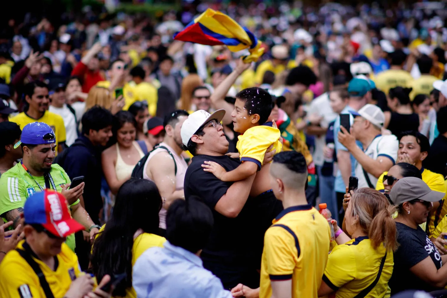 Ecuador fans celebrate during a watch party after their team won the 2026 World Cup football tournament match between Ecuador and Germany, at Hudson Yards Backyard in New York City, on June 25, 2026. (Photo by Leonardo MUNOZ / AFP)