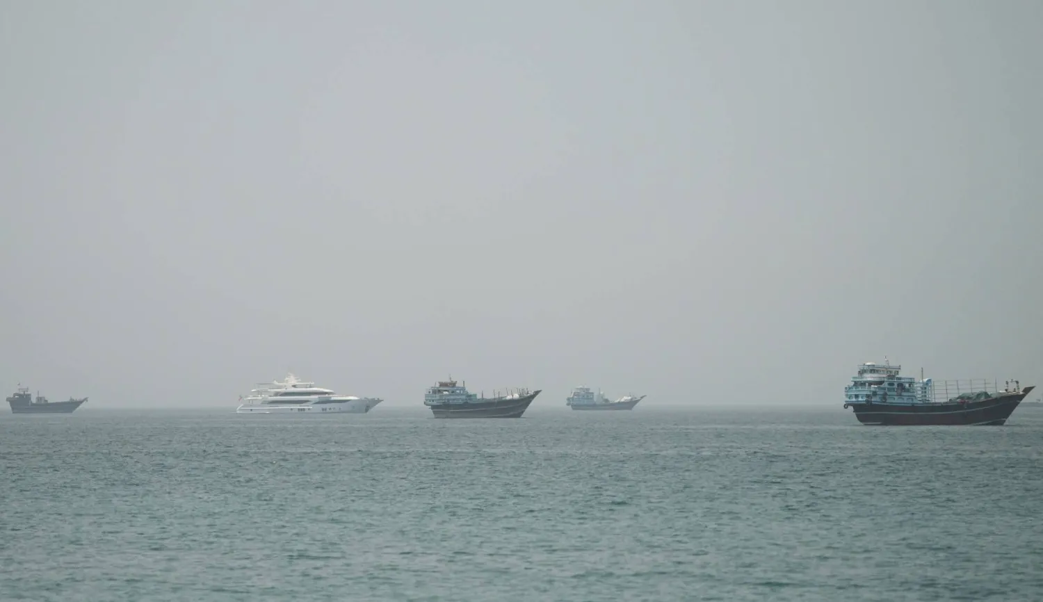 Vessels at the Strait of Hormuz, as seen from Musandam, Oman, June 24, 2026. (Reuters) 