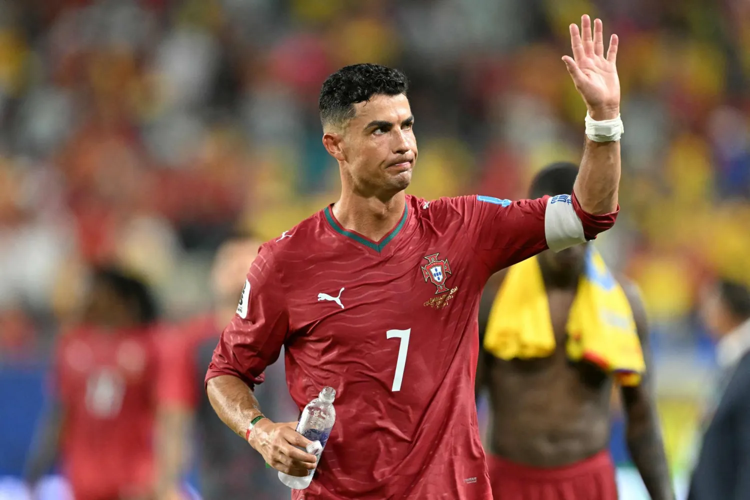 Portugal's forward #07 Cristiano Ronaldo waves to fans after the 2026 World Cup Group K football match between Colombia and Portugal at the Miami Stadium in Miami Gardens on June 27, 2026.  (Photo by CHANDAN KHANNA / AFP)