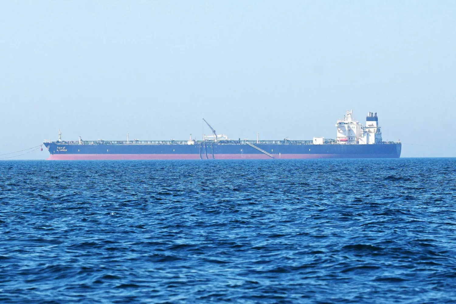 The 'Al-Yarmouk' oil tanker sails in the Arabian Gulf waters, off the coast of Kuwait City on June 27, 2026. (Photo by YASSER AL-ZAYYAT / AFP) 
