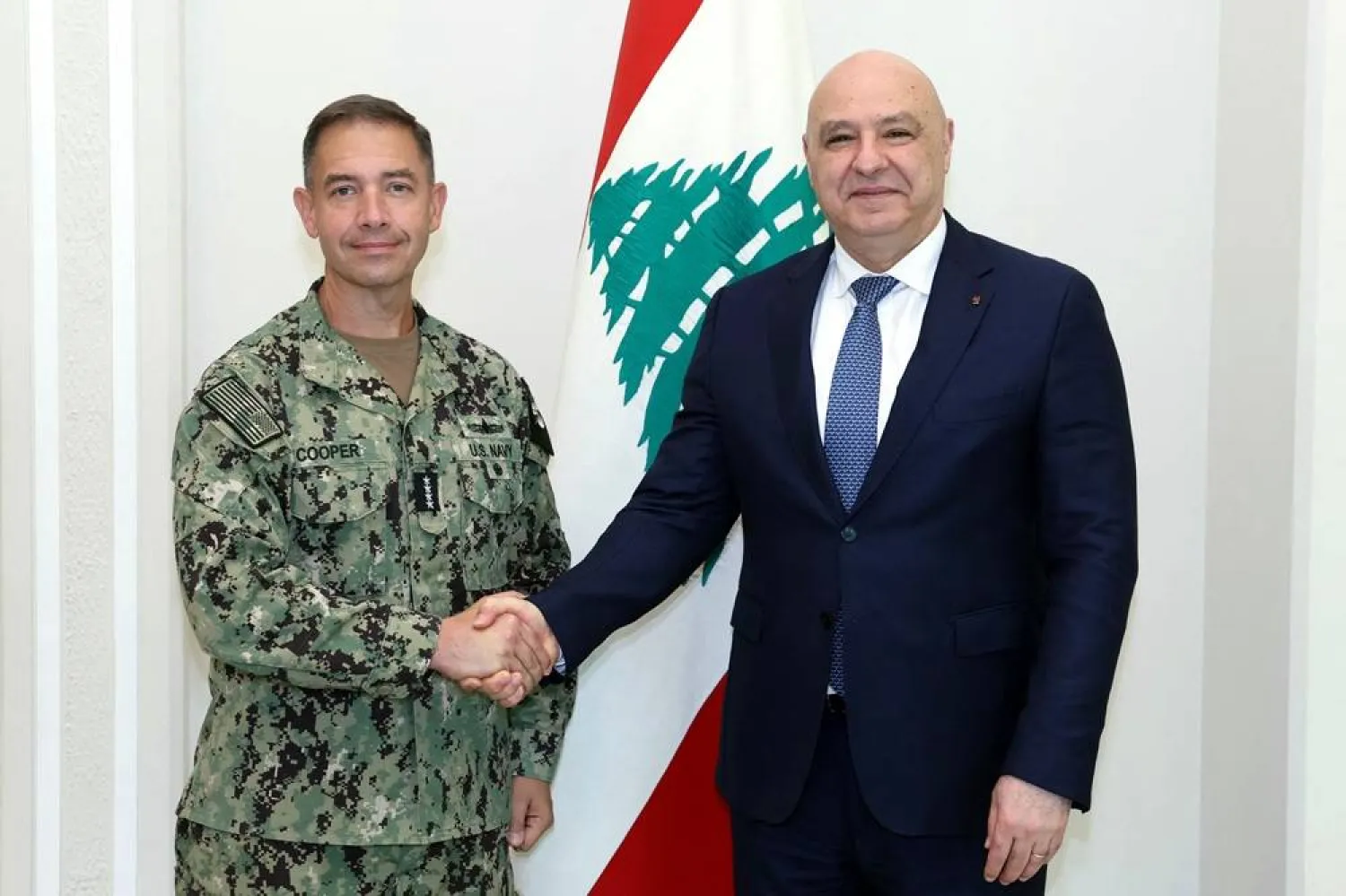 This handout photograph released by the Lebanese Presidency press office shows Lebanon's President Joseph Aoun (R) shaking hands with Admiral Brad Cooper, the commander of US Central Command (CENTCOM), during a meeting at the presidential palace in Baabda on June 29, 2026. (Lebanese Presidency) 