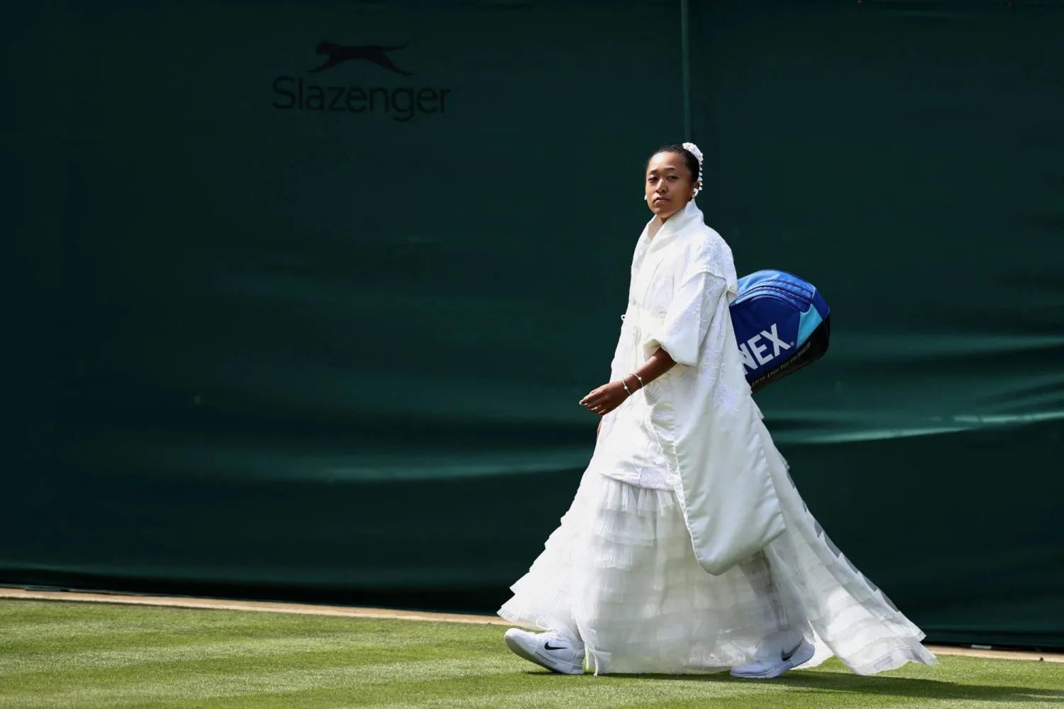 Japan's Naomi Osaka arrives to play against France's Elsa Jacquemot during their women's singles first round tennis match on the first day of the 2026 Wimbledon Championships at The All England Lawn Tennis and Croquet Club in Wimbledon, southwest London, on June 29, 2026. (AFP)