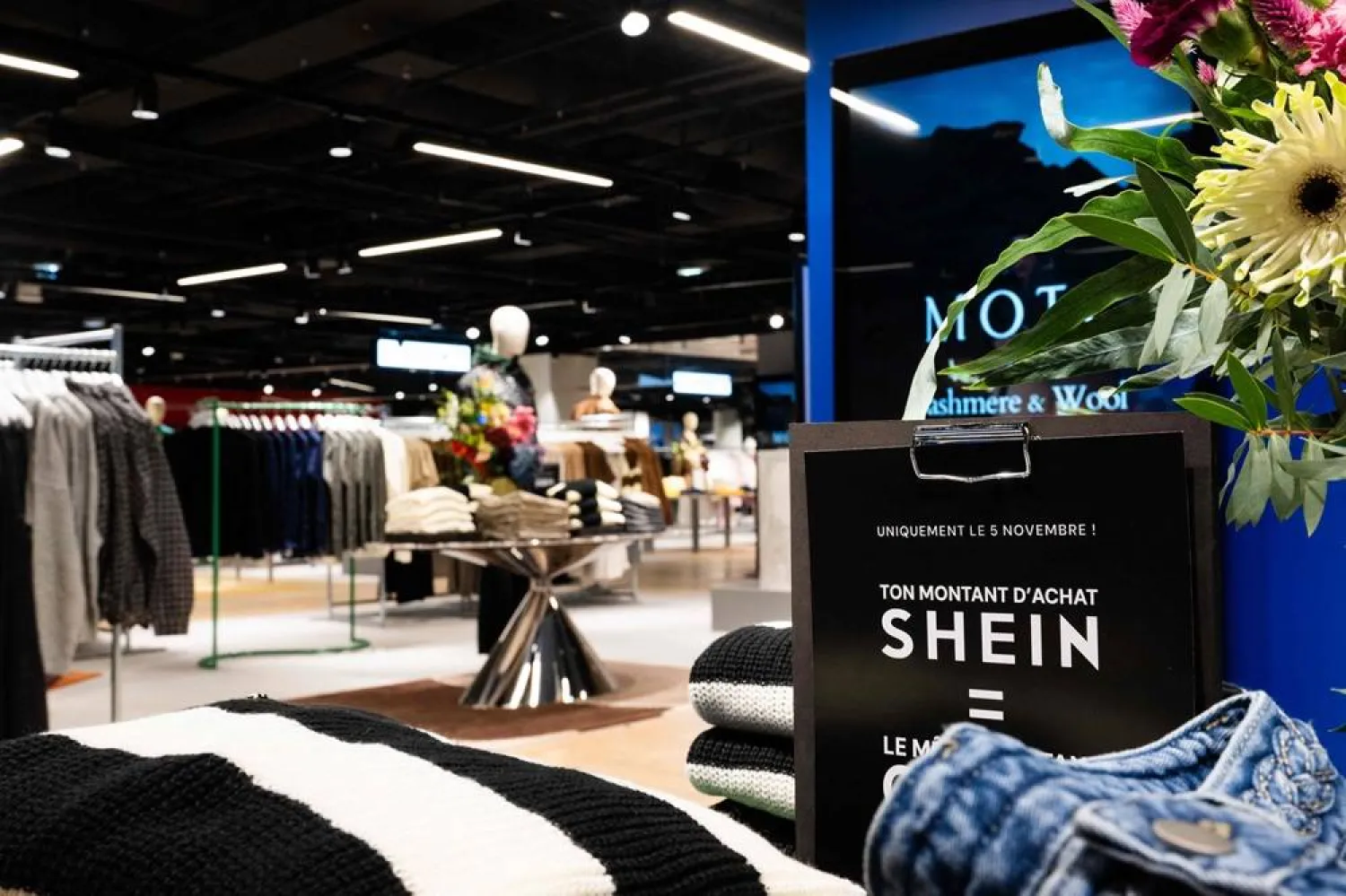 This photograph shows the logo of Asian e-commerce giant Shein in its stall at the Bazar de l'Hotel de Ville (BHV) department store in Paris on November 4, 2025, on the eve of the opening of its first physical store at BHV in Paris. (AFP)