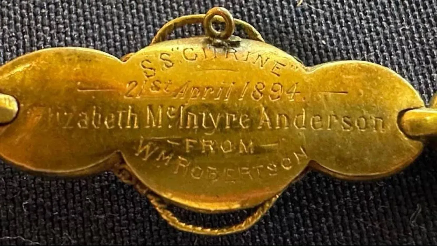 The brooch contains a dedication with the date April 21 1894 (AP)