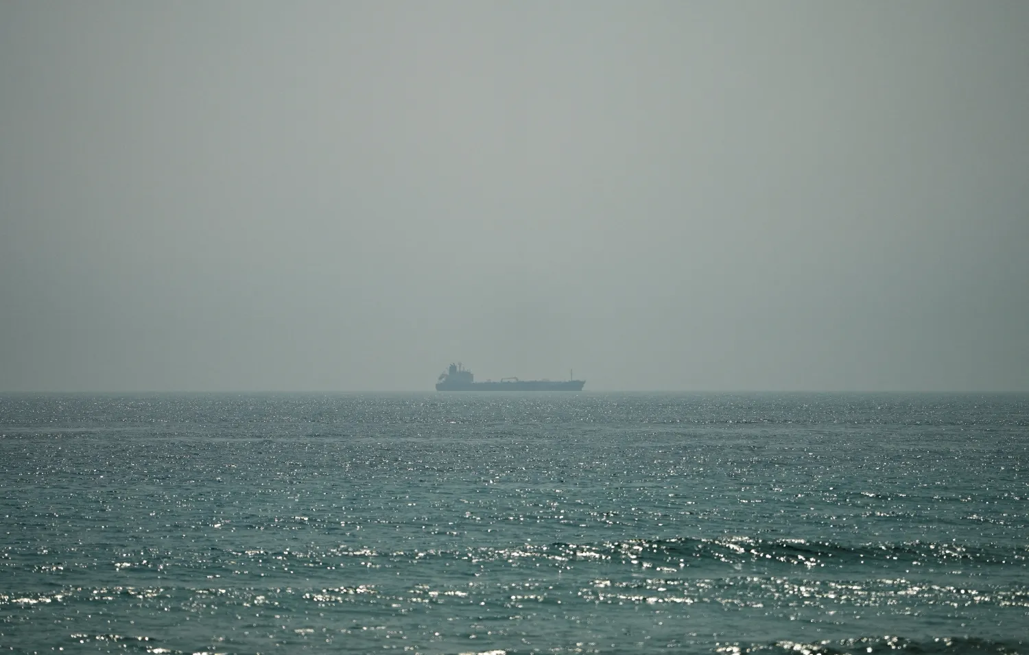 Oil tanker Al Shaffiah sails at the sea near the Omani coast, as seen from Musandam, Oman, June 26, 2026. REUTERS/Stringer