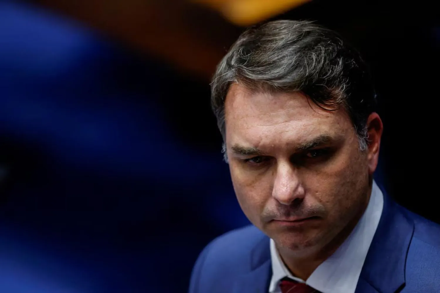 Flavio Bolsonaro, babasının seçim kampanyasındaki tepki çeken cinsiyetçi imajı değiştirmeye çalışıyor (Reuters)