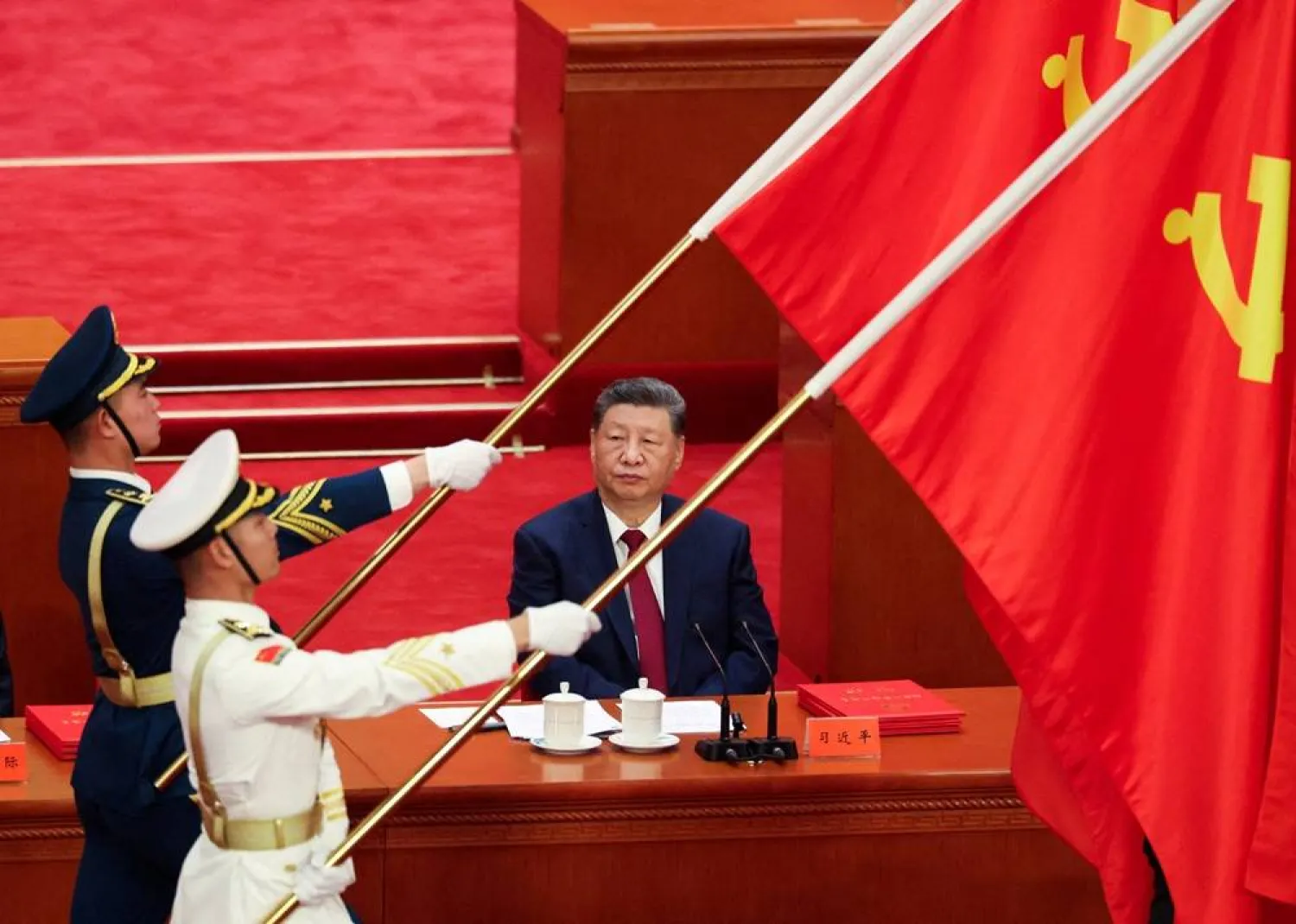Chinese President Xi Jinping looks on as People’s Liberation Army honor guard hold party flags during a ceremony marking the 105th anniversary of the founding of the Communist Party of China at the Great Hall of the People in Beijing, China, July 1, 2026. (Reuters)