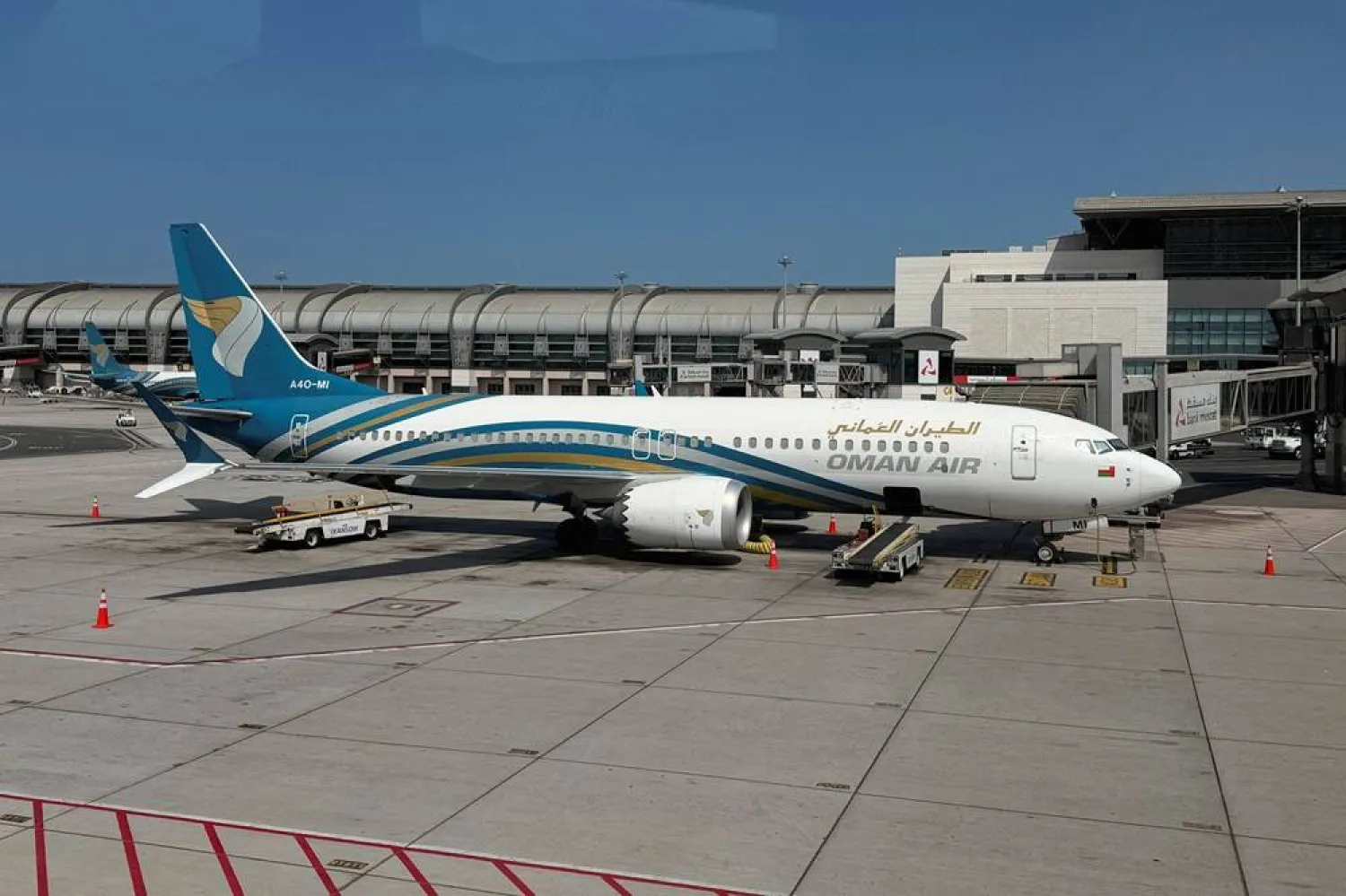 A Boeing 737 MAX 8 operated by Oman Air, on the tarmac at Muscat International Airport, amid the US-Israeli conflict with Iran, in Muscat, Oman, March 13, 2026. (Reuters)