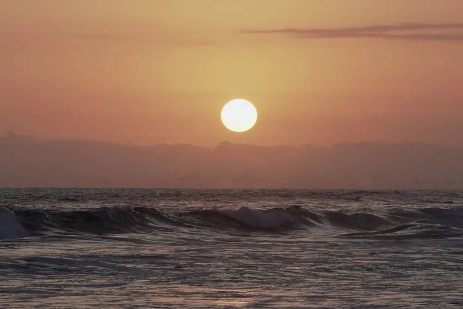 The sun sets over the Pacific Ocean, as seen from Huntington Beach, California, US, June 29, 2026. (Reuters)
