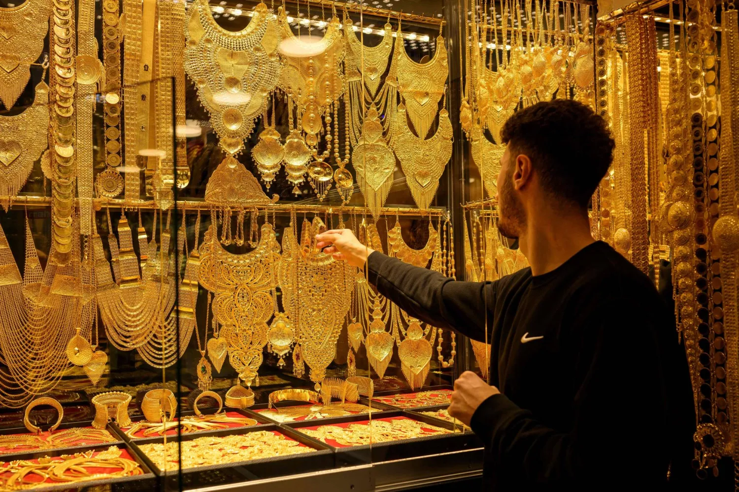 Gold bracelets and necklaces displayed for sale in a gold shop at Istanbul's Grand Bazaar (AFP)