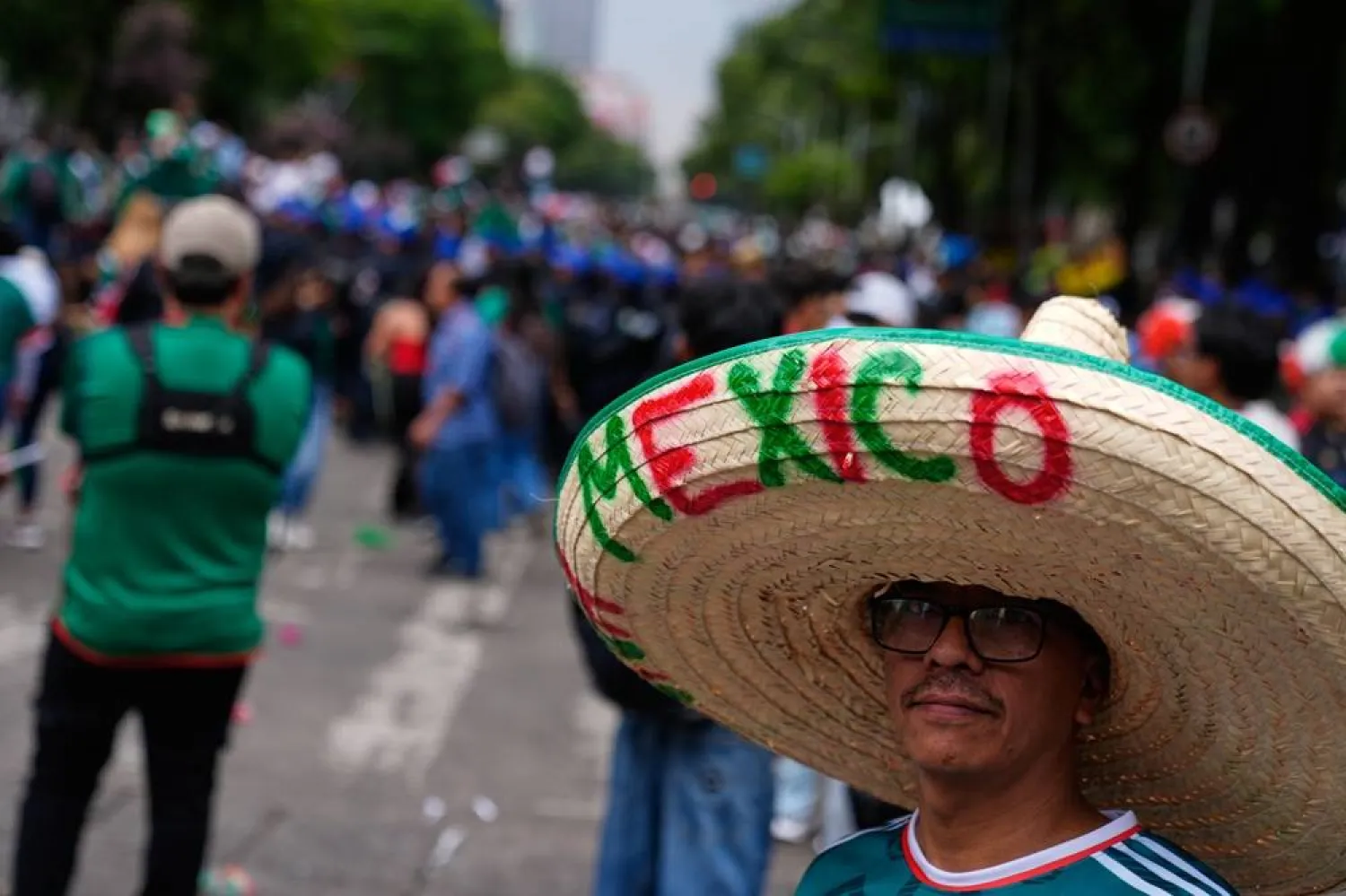  A football fan wearing a sombrero attends a watch party for the World Cup match between Mexico and Czechia on Reforma Ave., near the Angel of Independence monument in Mexico City, Wednesday, June 24, 2026. (AP) 