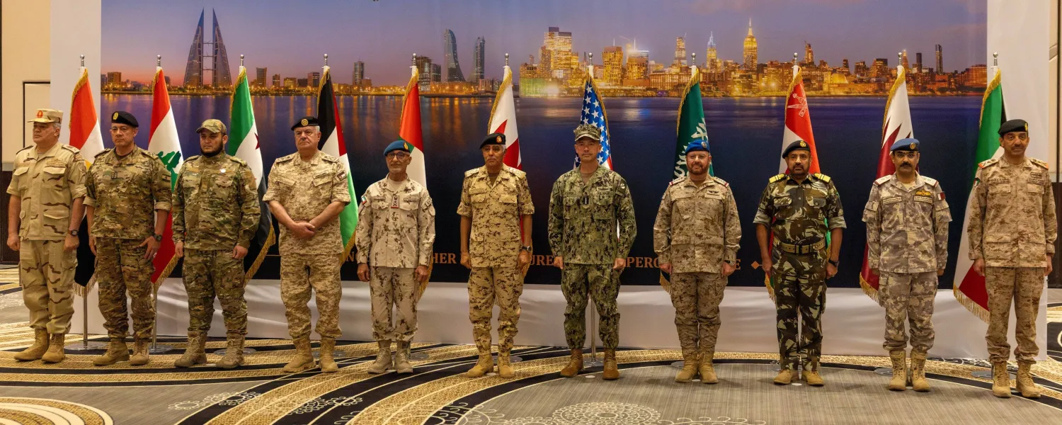 Participants pose for a family photo at the Bahrain conference. (CENTCOM)