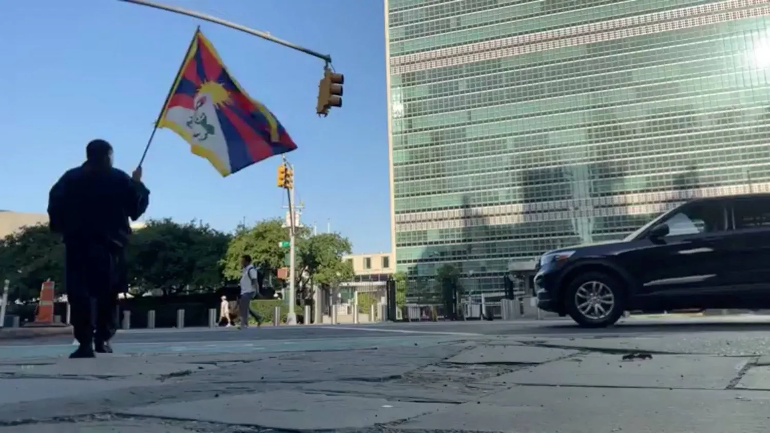 A man self-immolates outside the United Nations headquarters in New York (Reuters)