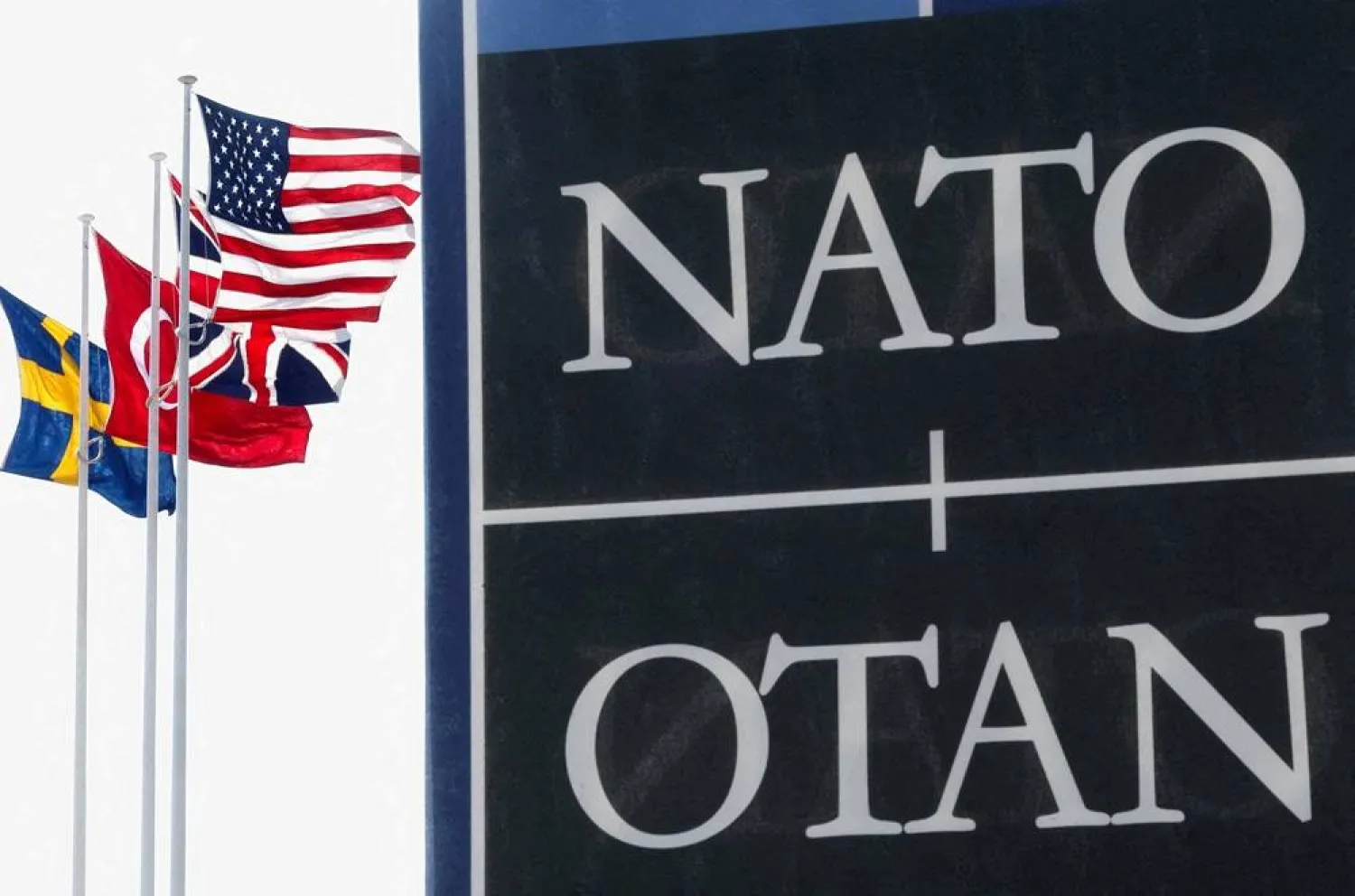 National flags of NATO members flutter at the alliance's headquarters in Brussels, Belgium April 2, 2025. (Reuters)