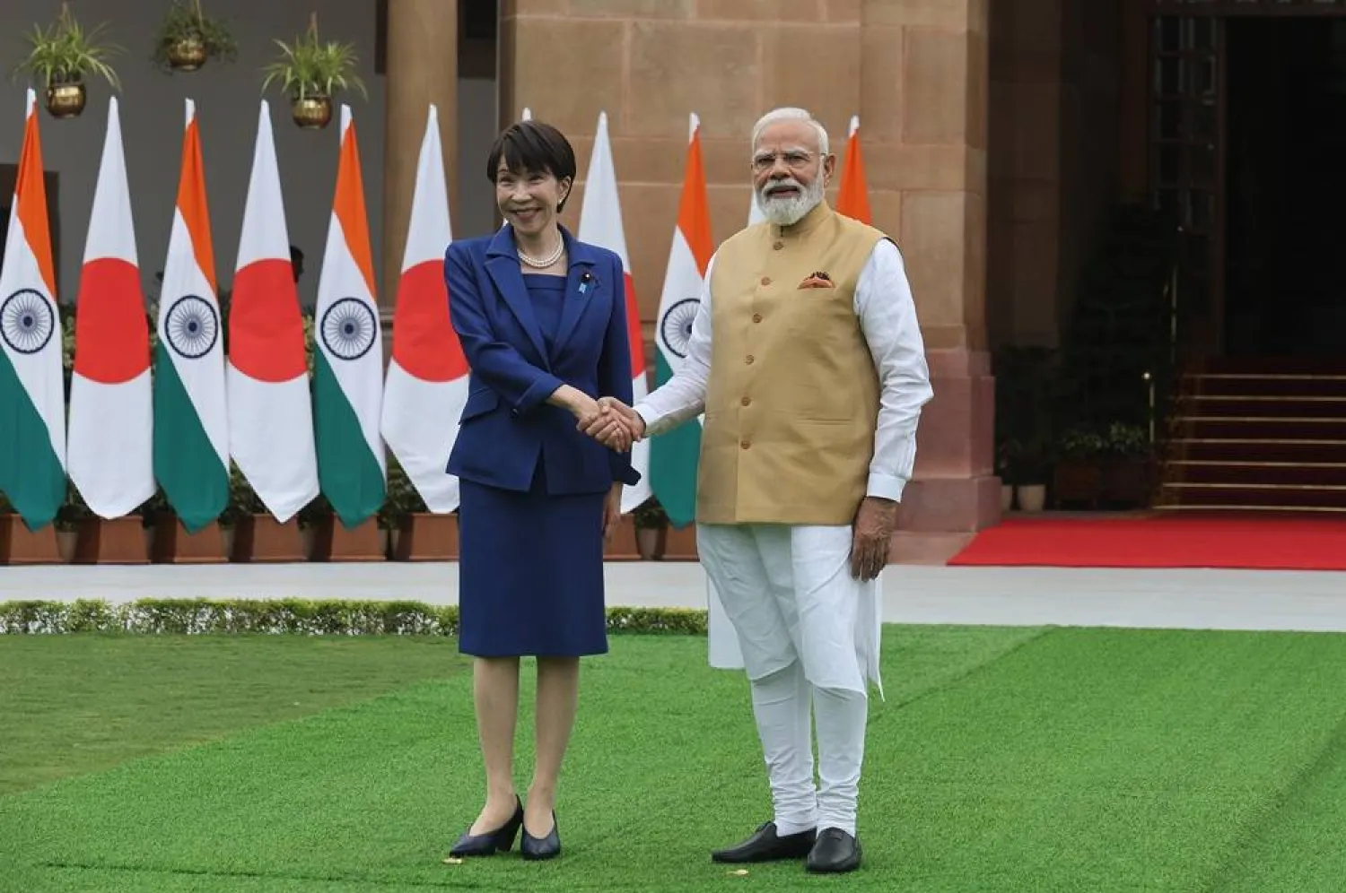 Indian Prime Minister Narendra Modi (R) shakes hands with Japanese Prime Minister Sanae Takaichi prior to their meeting at Hyderabad House in New Delhi, India, 02 July 2026. (EPA)