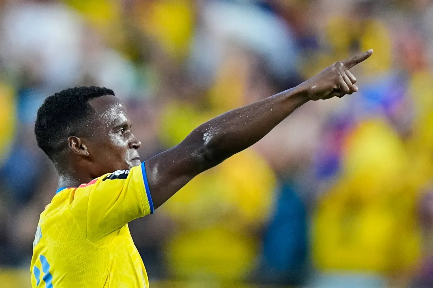 Colombia's Jhon Arias (11) reacts after scoring his team's first goal during the World Cup round of 32 soccer match between Colombia and Ghana in Kansas City, Mo., Friday, July 3, 2026. (AP Photo/Charlie Riedel)