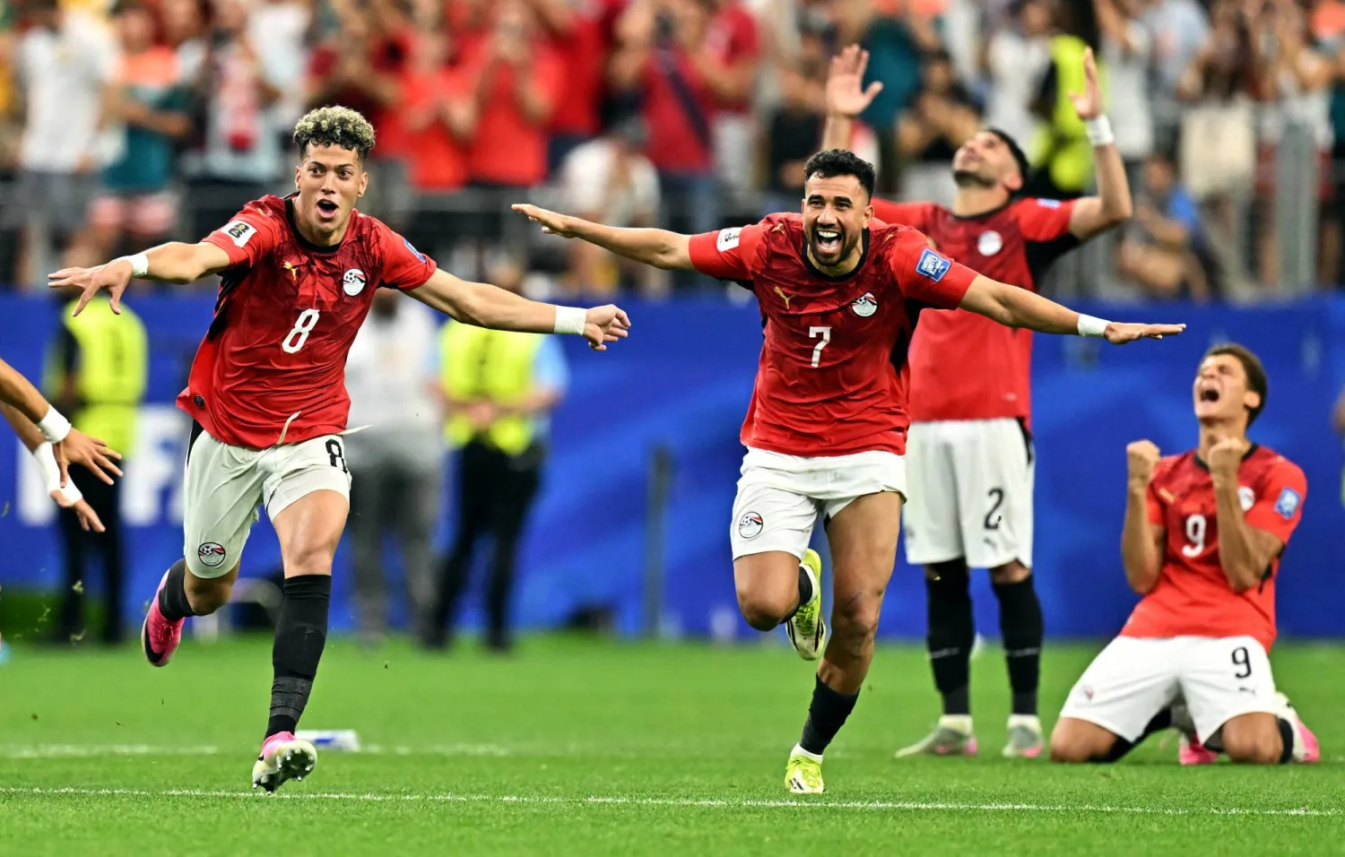Soccer Football - FIFA World Cup 2026 - Round of 32 - Australia v Egypt - Dallas Stadium, Arlington, Texas, US - July 3, 2026 Egypt's Trezeguet and Egypt's Emam Ashour celebrate after the match as Egypt qualify for the Round of 16 stage of the World Cup IMAGN IMAGES via Reuters/Maria Lysaker