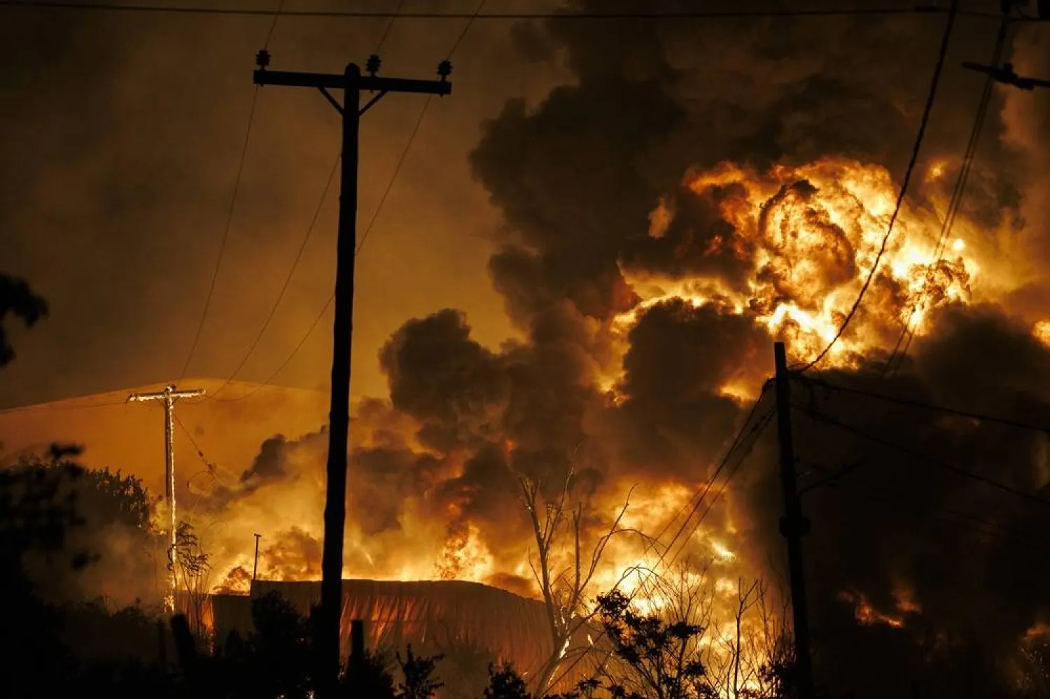 Α building burns during a wildfire in Oreokastro, near Thessaloniki, Greece, 05 July 2026. (EPA)