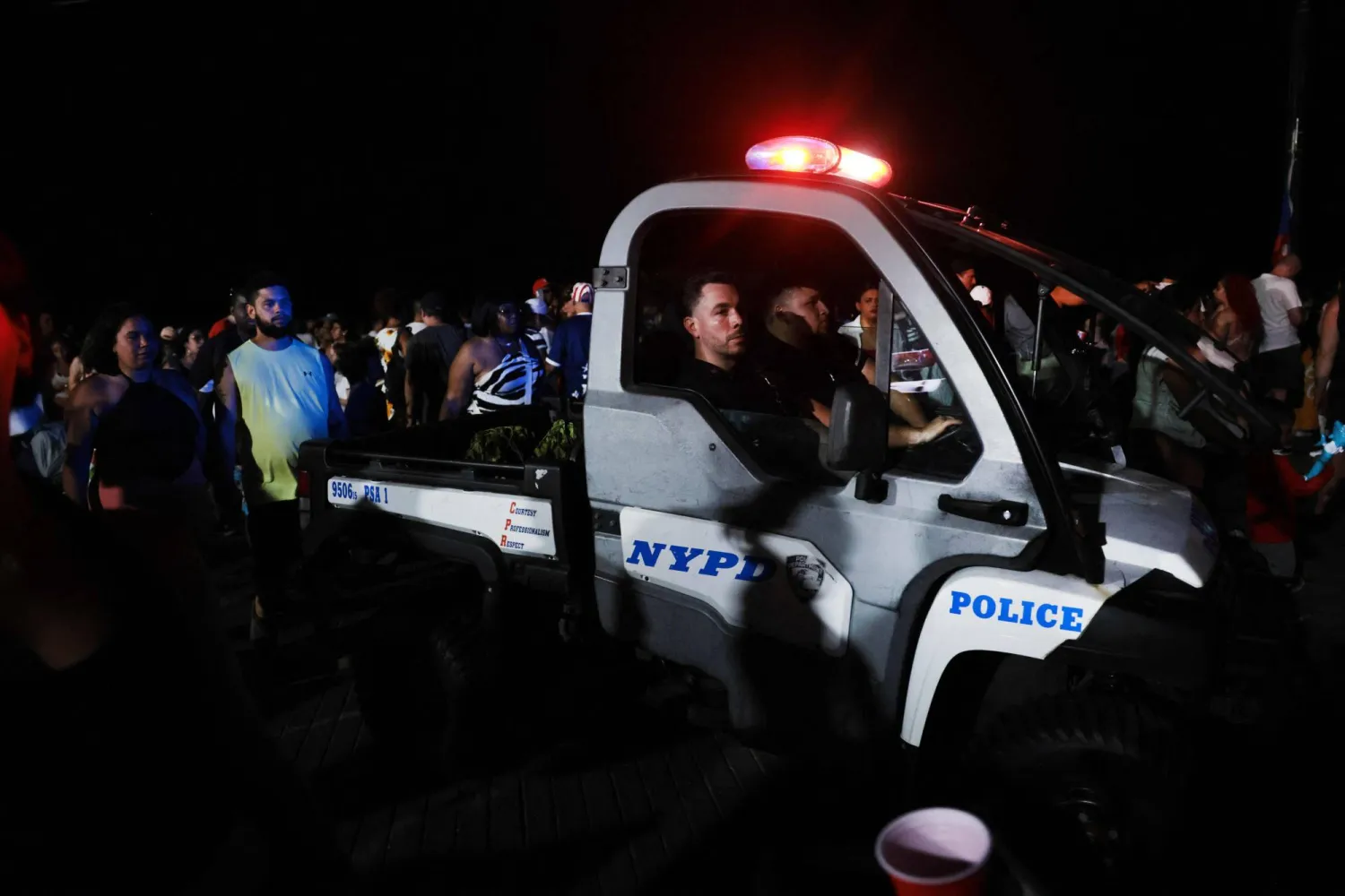 NEW YORK - JULY 04: Police patrol the boardwalk at Coney Island in Brooklyn on July 04, 2026, in New York City. Spencer Platt/Getty Images/AFP (Photo by SPENCER PLATT / GETTY IMAGES NORTH AMERICA / Getty Images via AFP)
