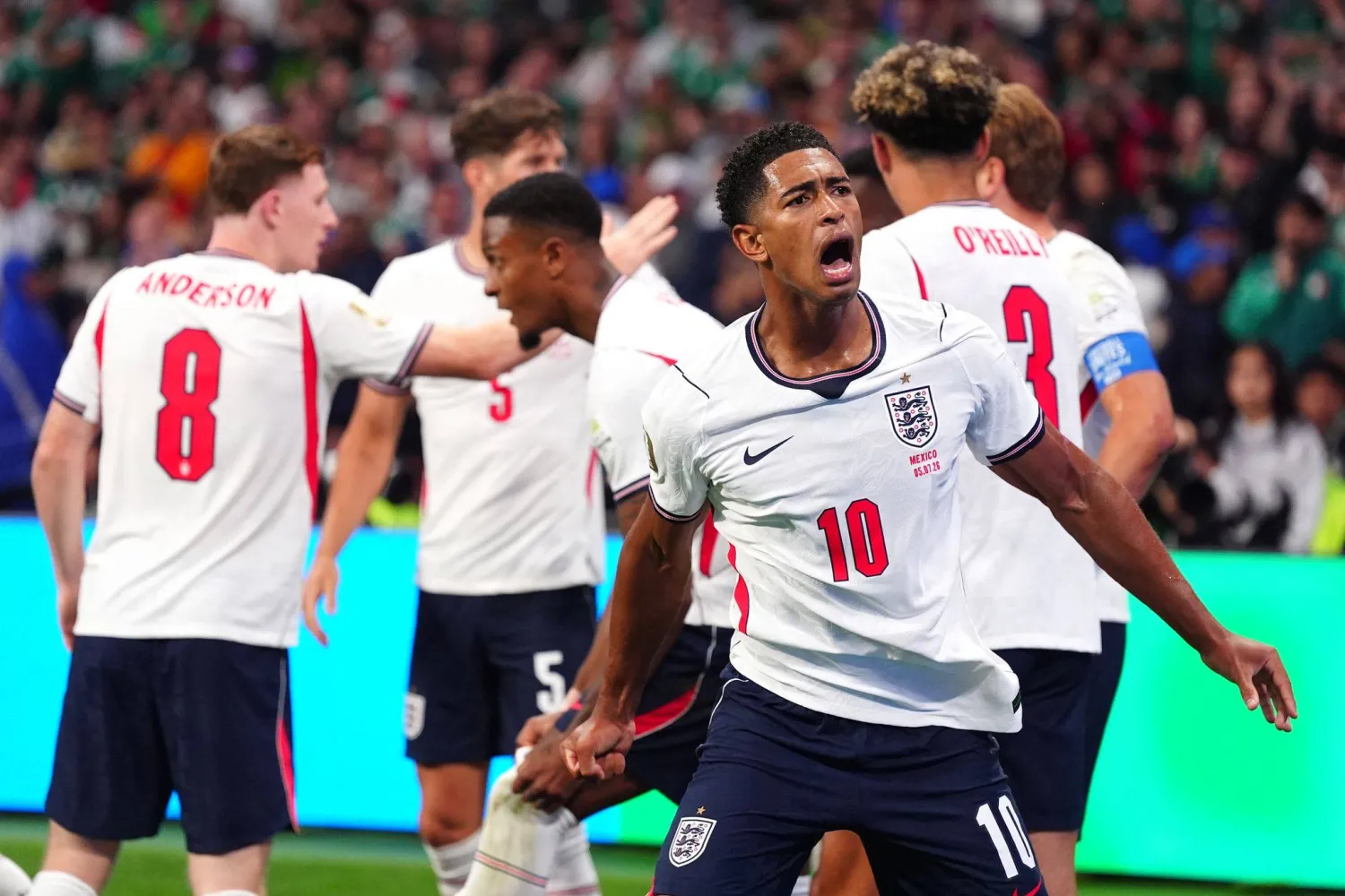 05 July 2026, Mexico, Mexico City: England's Jude Bellingham celebrates his team's third goal scored from the penalty spot by teammate Harry Kane during the 2026 FIFA World Cup Round of 16 knockout match between England and Mexico at Mexico City Stadium. Photo: Bradley Collyer/PA Wire/dpa
