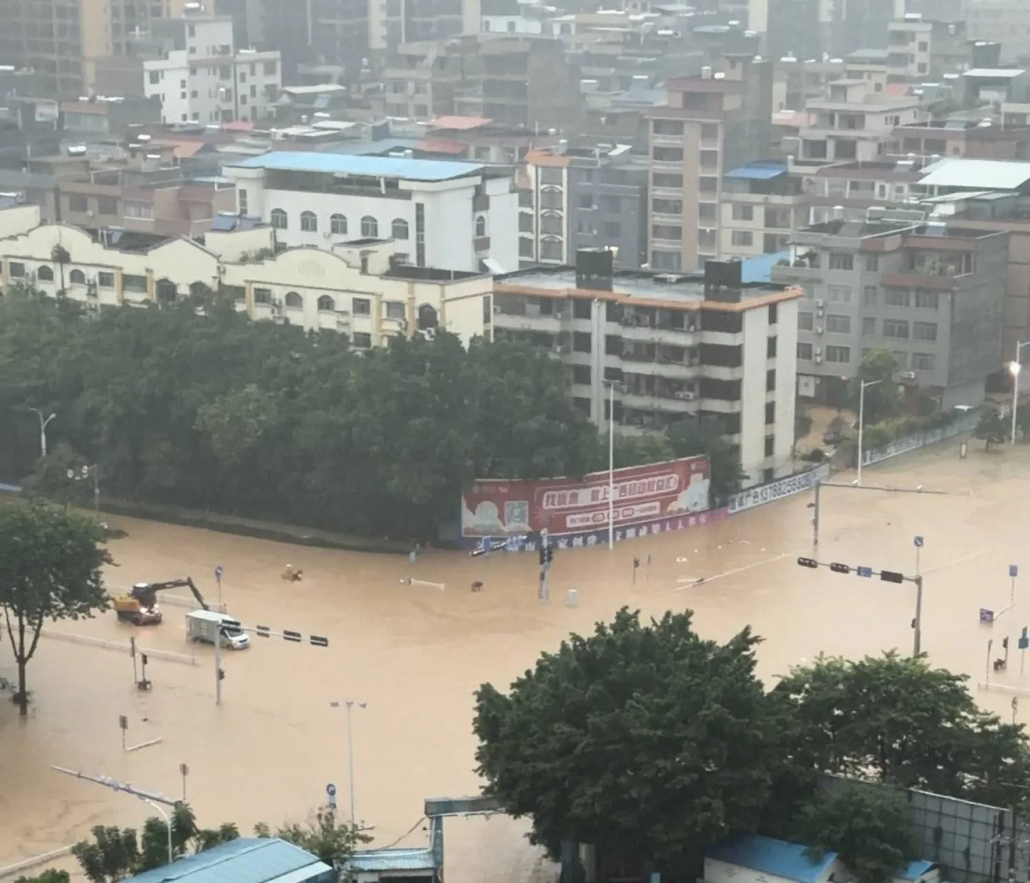 Floodwater flows down the side of a ramp at a construction site, amid heavy rain brought by Typhoon Maysak, in Guigang, Guangxi Zhuang Autonomous Region, China, in this still image obtained from social media video. (Social Media/via Reuters)