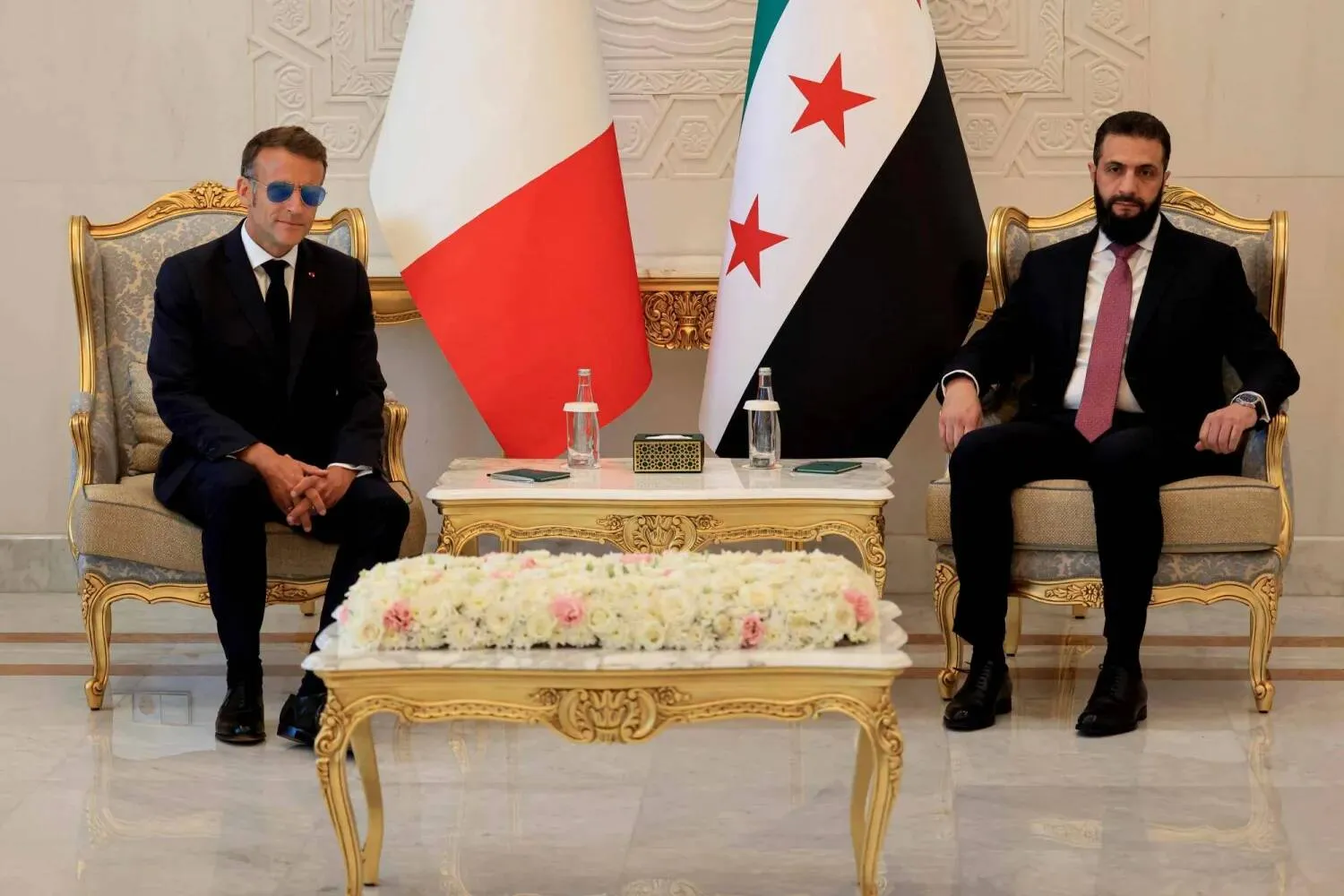 French President Emmanuel Macron and Syrian President Ahmed al-Sharaa (AFP)