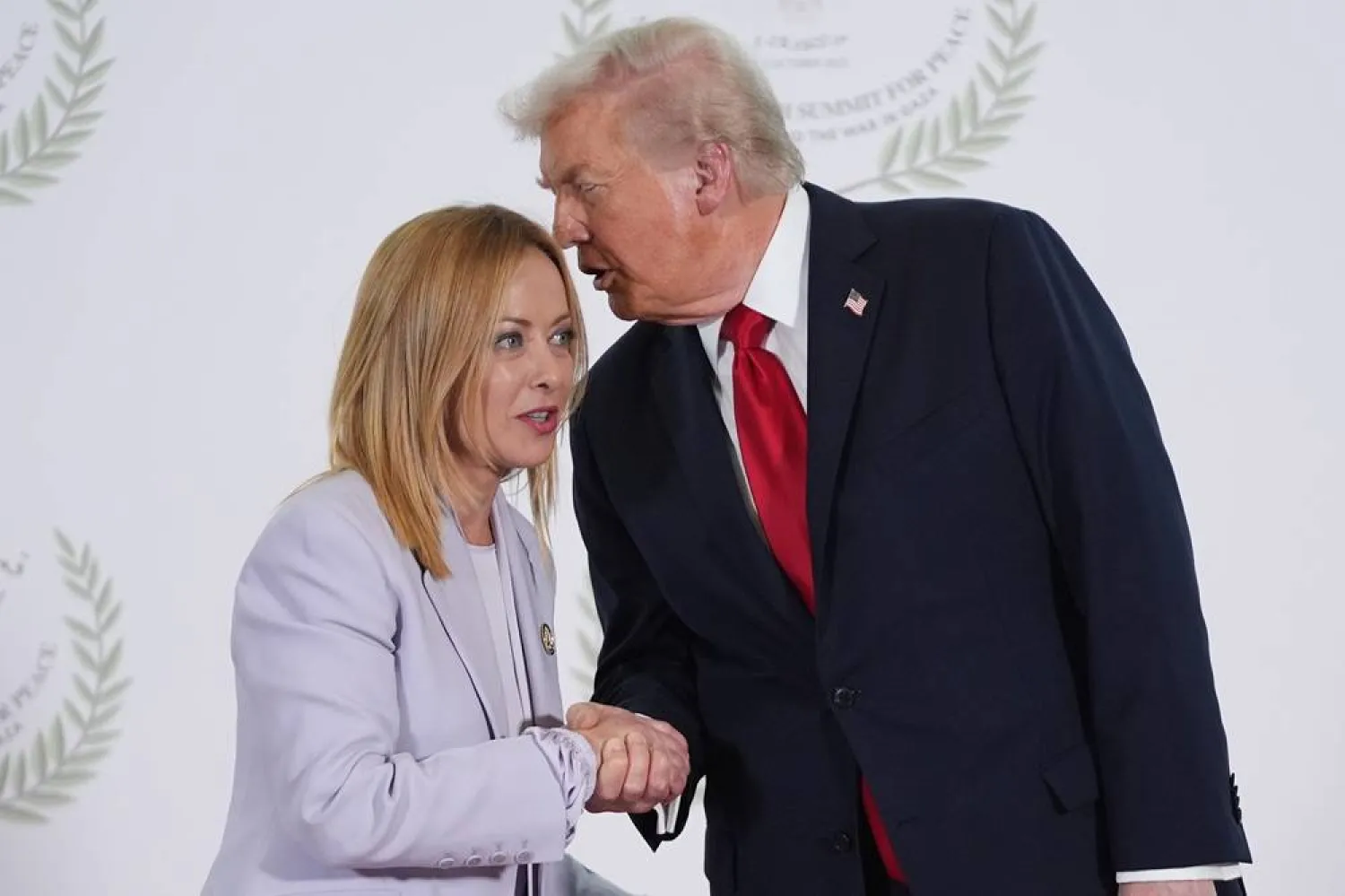 President Donald Trump greets Italy's Prime Minister Giorgia Meloni during summit to support ending the more than two-year Israel-Hamas war in Gaza after a breakthrough ceasefire deal, Oct. 13, 2025, in Sharm El Sheikh, Egypt. (AP)