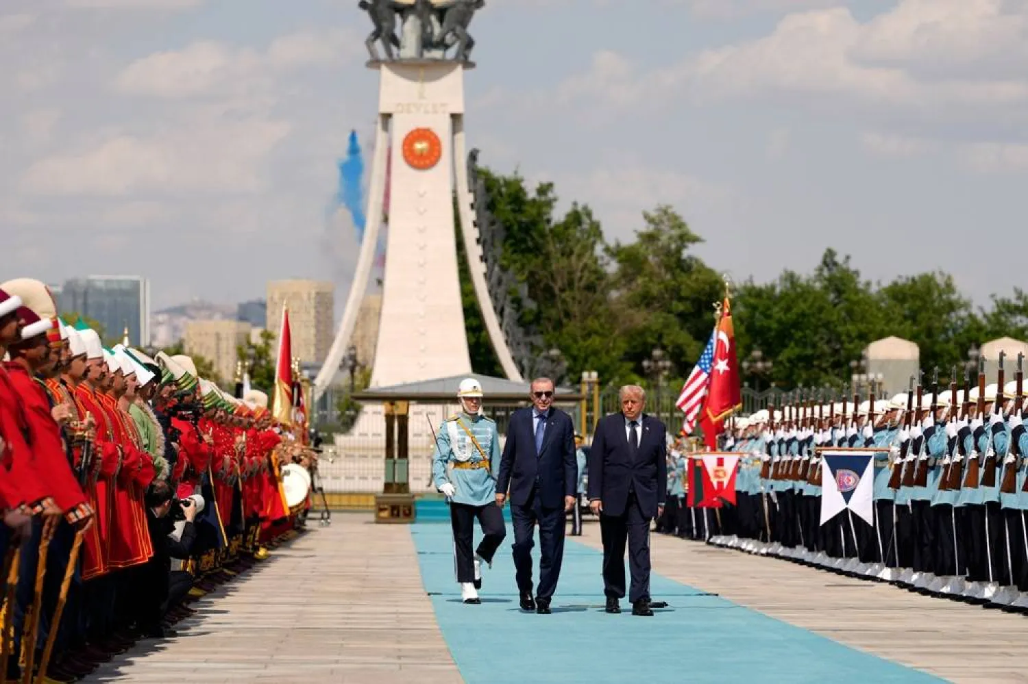 US President Donald Trump walks with Turkish President Recep Tayyip Erdogan during a formal arrival at the Bestepe Presidential Compound at the NATO summit in Ankara, Türkiye, Tuesday, July 7, 2026. (Reuters) 