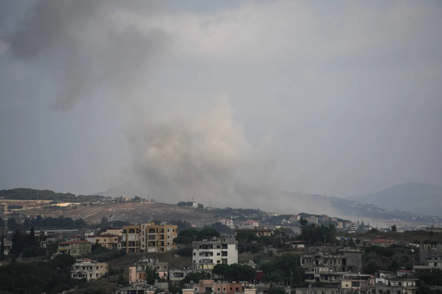 A photograph taken from the southern city of Nabatieh shows smoke rising from the site of an Israeli airstrike on the village of Nabatieh al-Fawqa on July 5, 2026. (AFP)