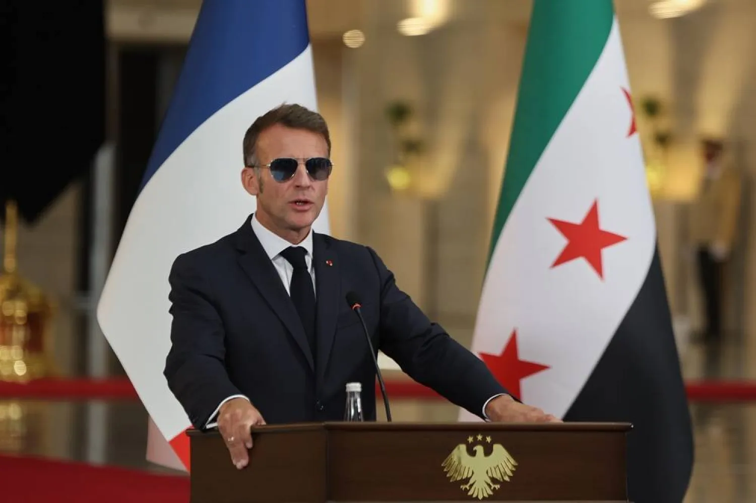  French President Emmanuel Macron speaks during a joint press conference with Syrian President Ahmed al-Sharaa in Damascus, Syria, Tuesday, July 7, 2026. (AP) 