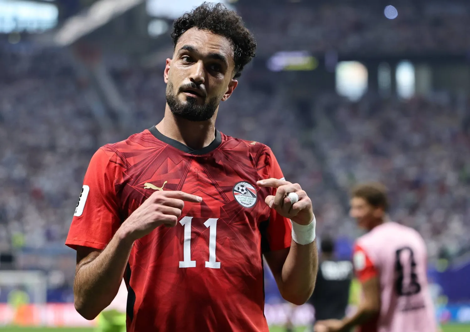 مصطفى زيكو يحتفل بتسجيل الهدف الثاني لمصر (إ.ب.أ)
