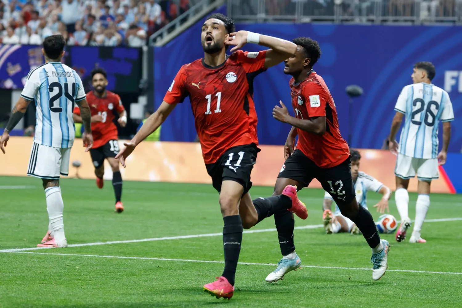 مصطفى زيكو يحتفل بتسجيل هدف مصر الأول (أ.ب)
