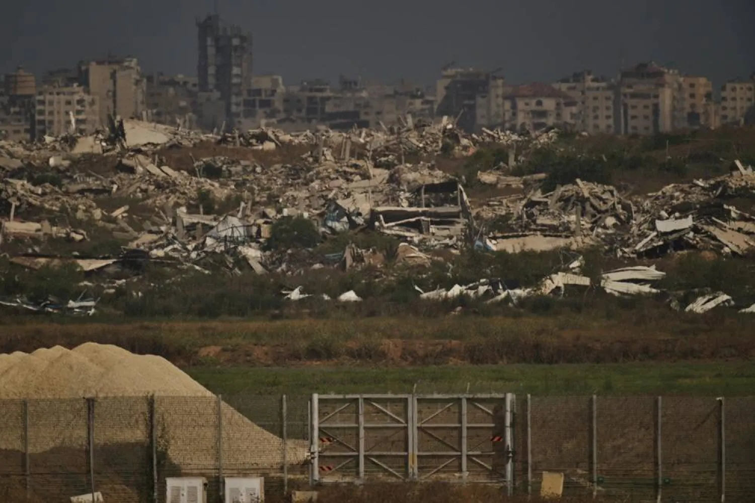  Buildings that were destroyed during the Israeli ground and air operations stand in the northern Gaza Strip as seen from southern Israel, Thursday, July 2, 2026, on the 1,000th day of war since the Hamas-led attack on Israel sparked the war in Gaza. (AP) 