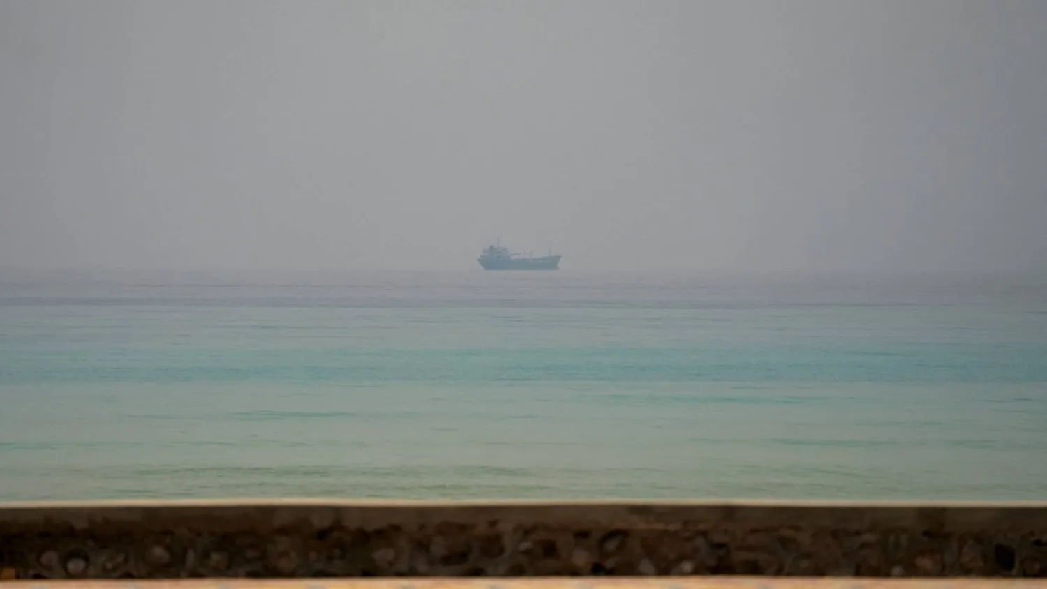  A vessel at the Strait of Hormuz, as seen from Musandam, Oman, July 8, 2026. (Reuters)