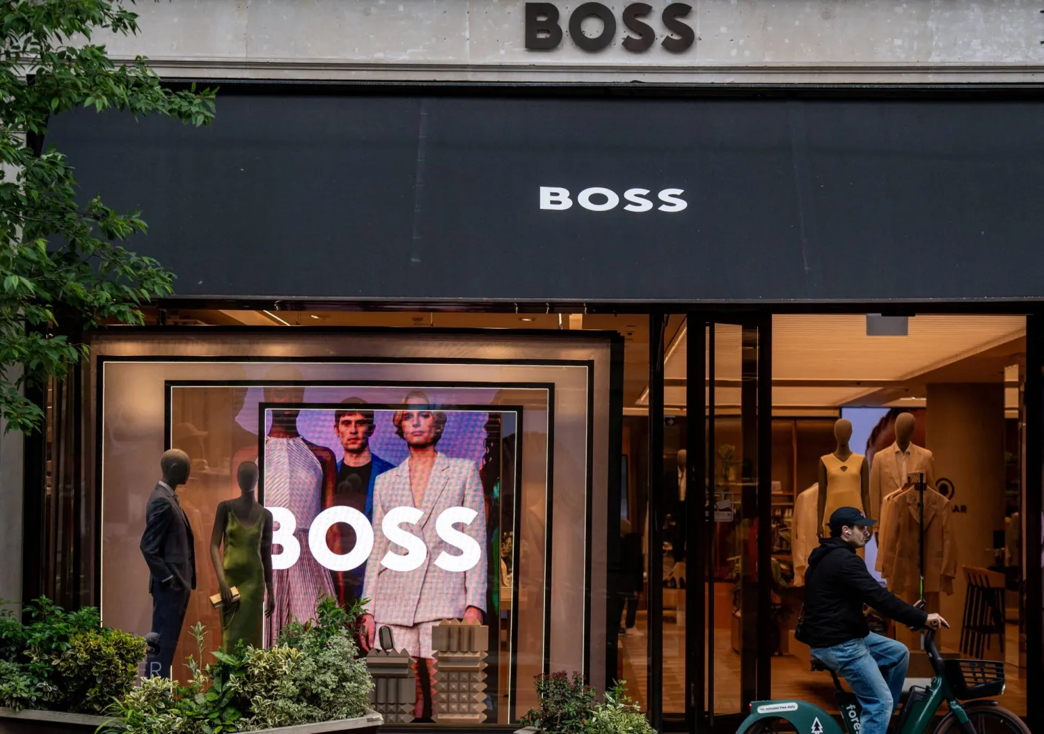 FILE PHOTO: A window display is seen at the Boss store in London, Britain, May 30,2024. REUTERS/Chris J. Ratcliffe/File Photo