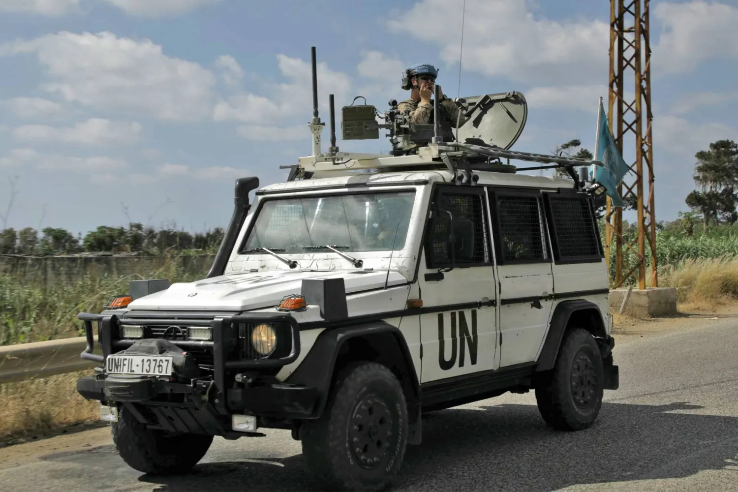 Members of United Nations Peacekeeping Force in Lebanon (UNIFIL) drive through the southern Lebanese area of Al-Mansouri on July 2, 2026.  (Photo by Kawnat HAJU / AFP)