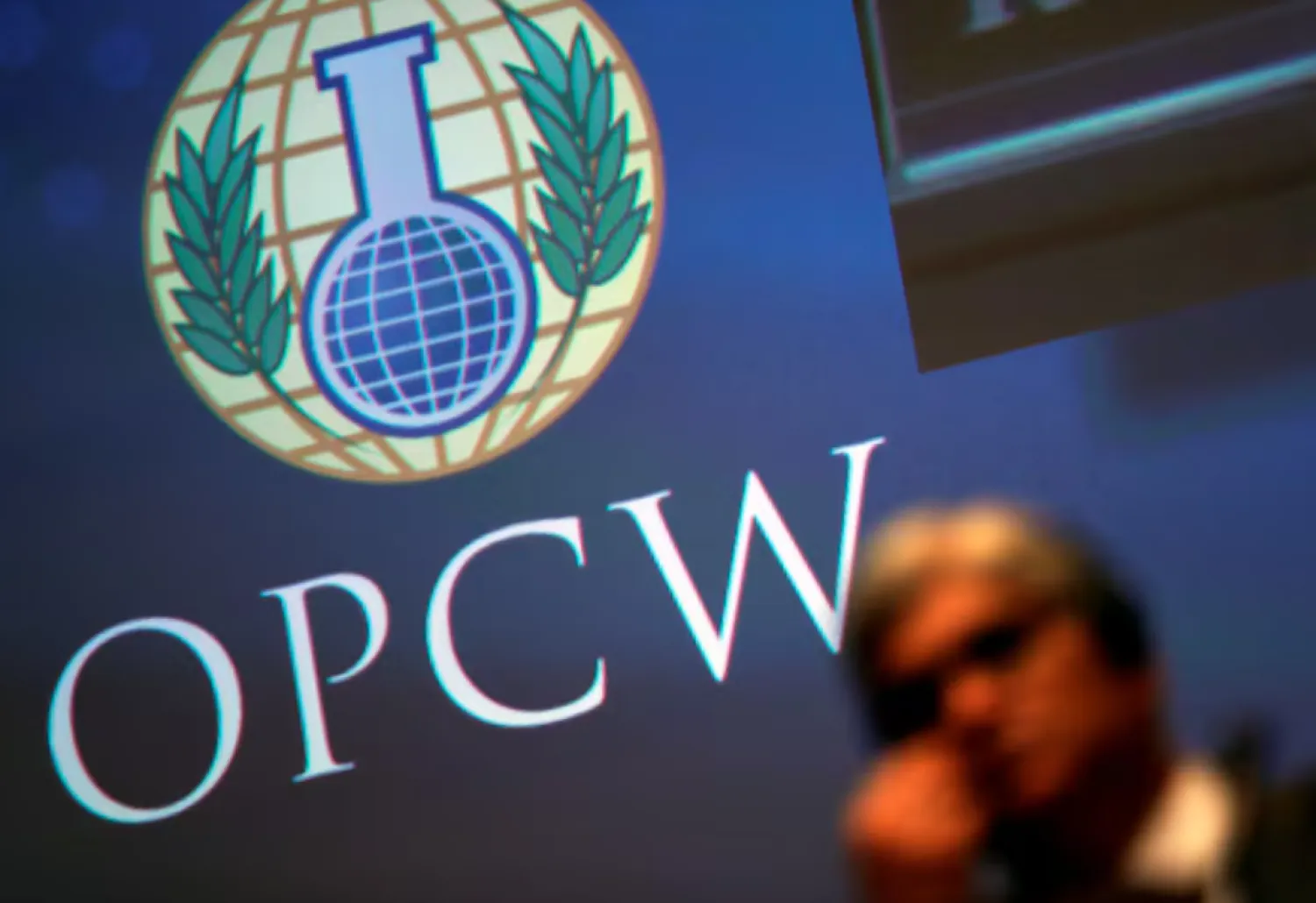 The logo of the Organization for the Prohibition of Chemical Weapons (OPCW) is seen during a special session in the Hague, Netherlands June 26, 2018. REUTERS/Yves Herman/File Photo