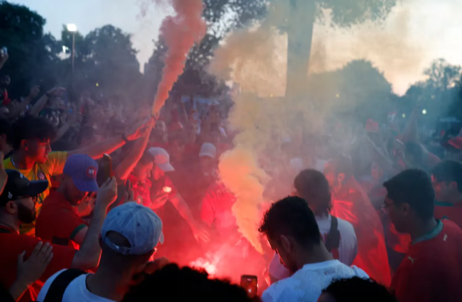 FIFA World Cup 2026 - Quarter Final - France v Morocco - Fans gather in Boston, Massachusetts, US - July 8, 2026 Morocco fans light flares as they gather on Boston Common ahead of their game against France REUTERS/Brian Snyder 