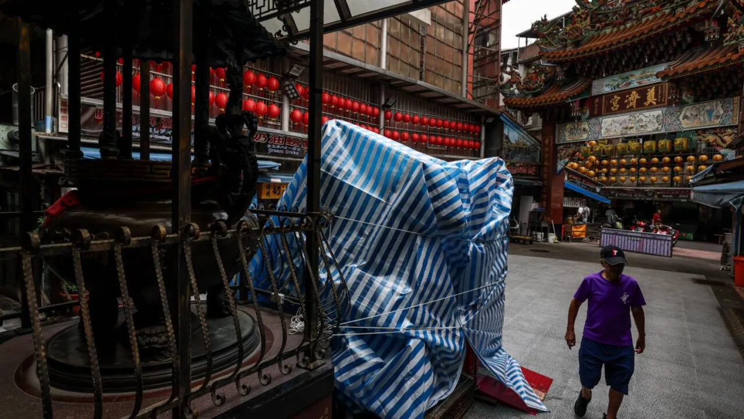 Bavi's strong-wind radius of 380 kilometers (240 miles) will make it the largest typhoon to hit Taiwan in more than 30 years. I-Hwa Cheng / AFP