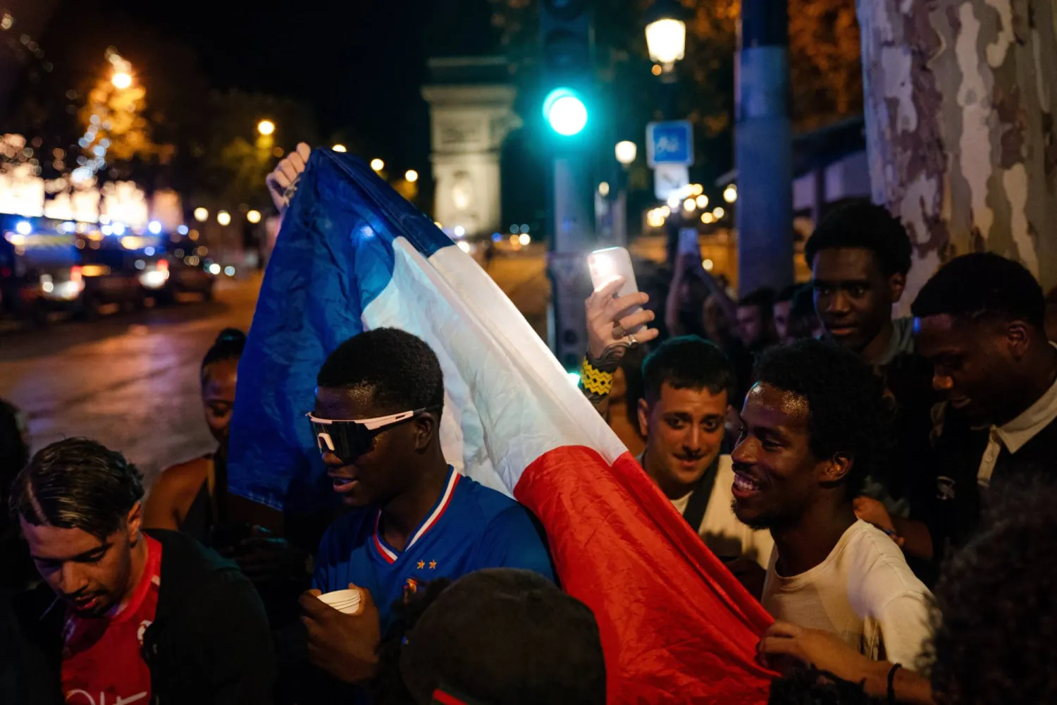 French fans celebrate their team on the Champs-Elysees avenue in Paris, France, after winning the 2026 FIFA World Cup quarterfinal match against Morocco, 10 July 2026.  EPA/Fadi Yousef