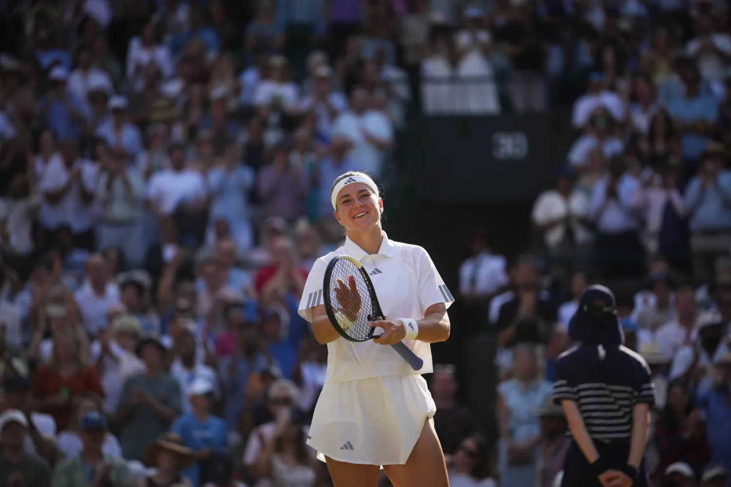 Karolina Muchova of Czech Republic celebrates her victory against Naomi Osaka of Japan in their quarter-final women's singles match at the Wimbledon Tennis Championships in London, Tuesday, July 7, 2026. (AP Photo/Kin Cheung)