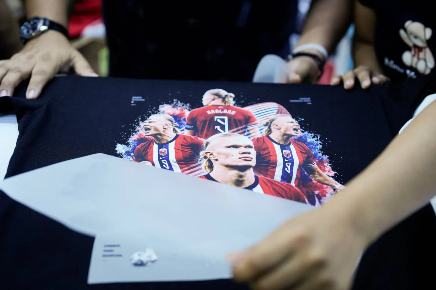 A shirt depicting Norway striker Erling Haaland on sale at a store, as his performances at the 2026 FIFA World Cup and the buzz he has generated on social media drive demand for merchandise featuring his image, in Lima, Peru, July 10, 2026. (Reuters)