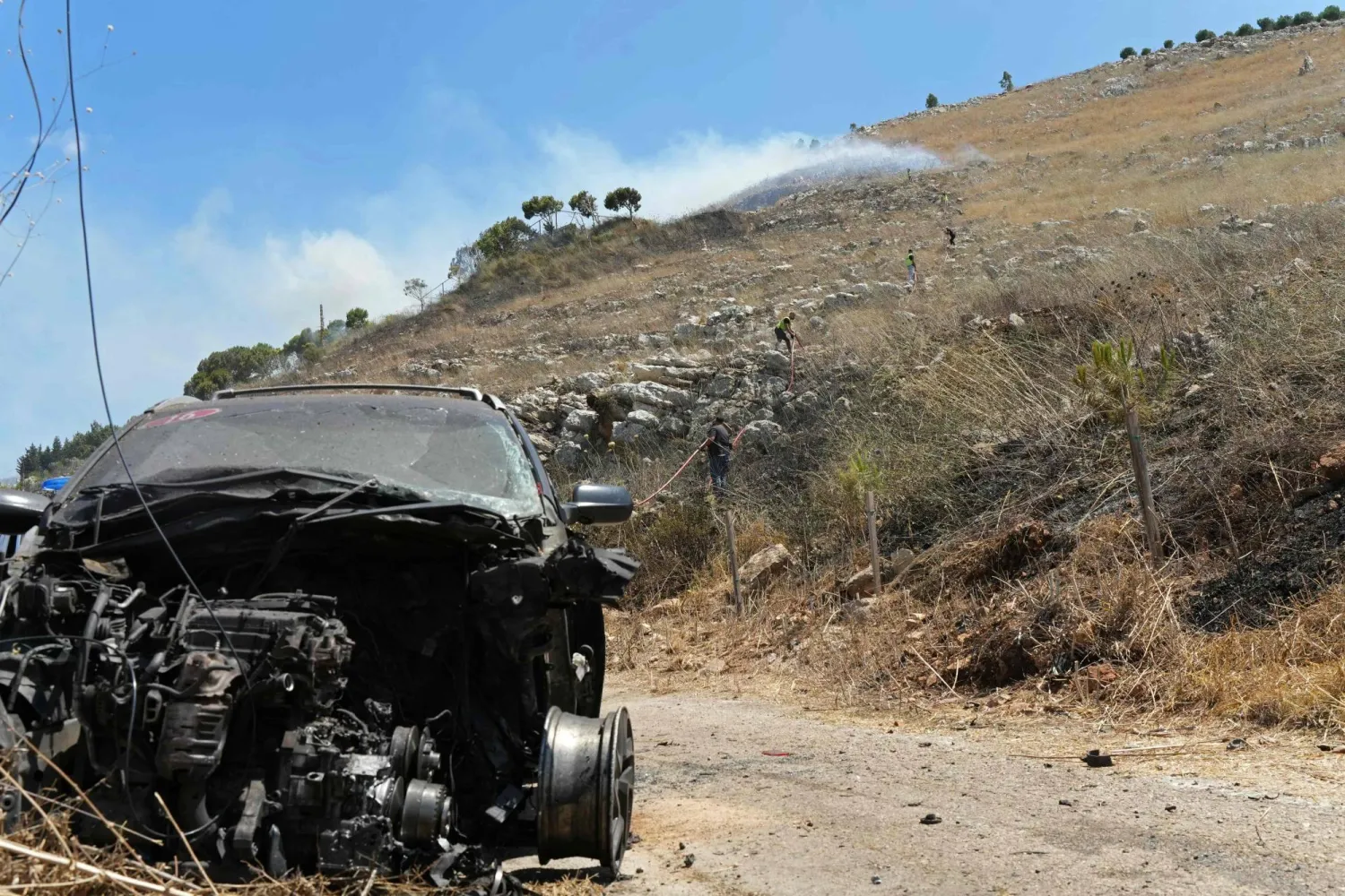 A vehicle that was reportedly damaged by an Israeli strike is pictured in the southern Lebanese village of Kfar Rumman on July 10, 2026. (AFP)