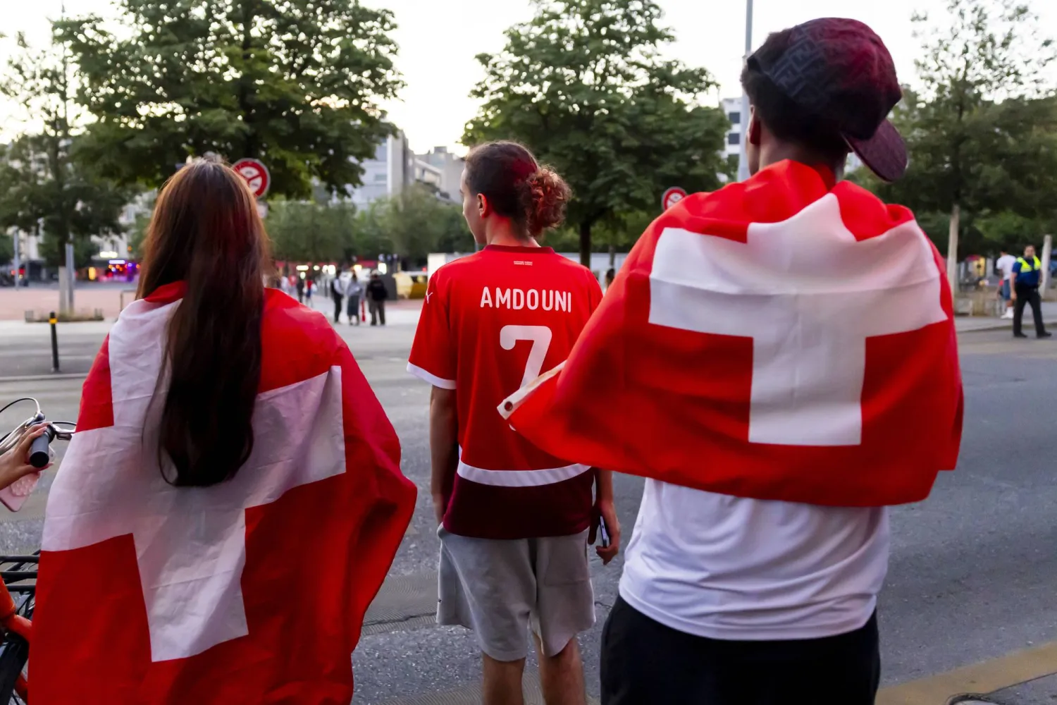 Swiss supporters react after Switzerland's defeat by Argentina in their 2026 FIFA World Cup quarter-final match in Geneva, Switzerland, 12 July 2026.  EPA/SALVATORE DI NOLFI