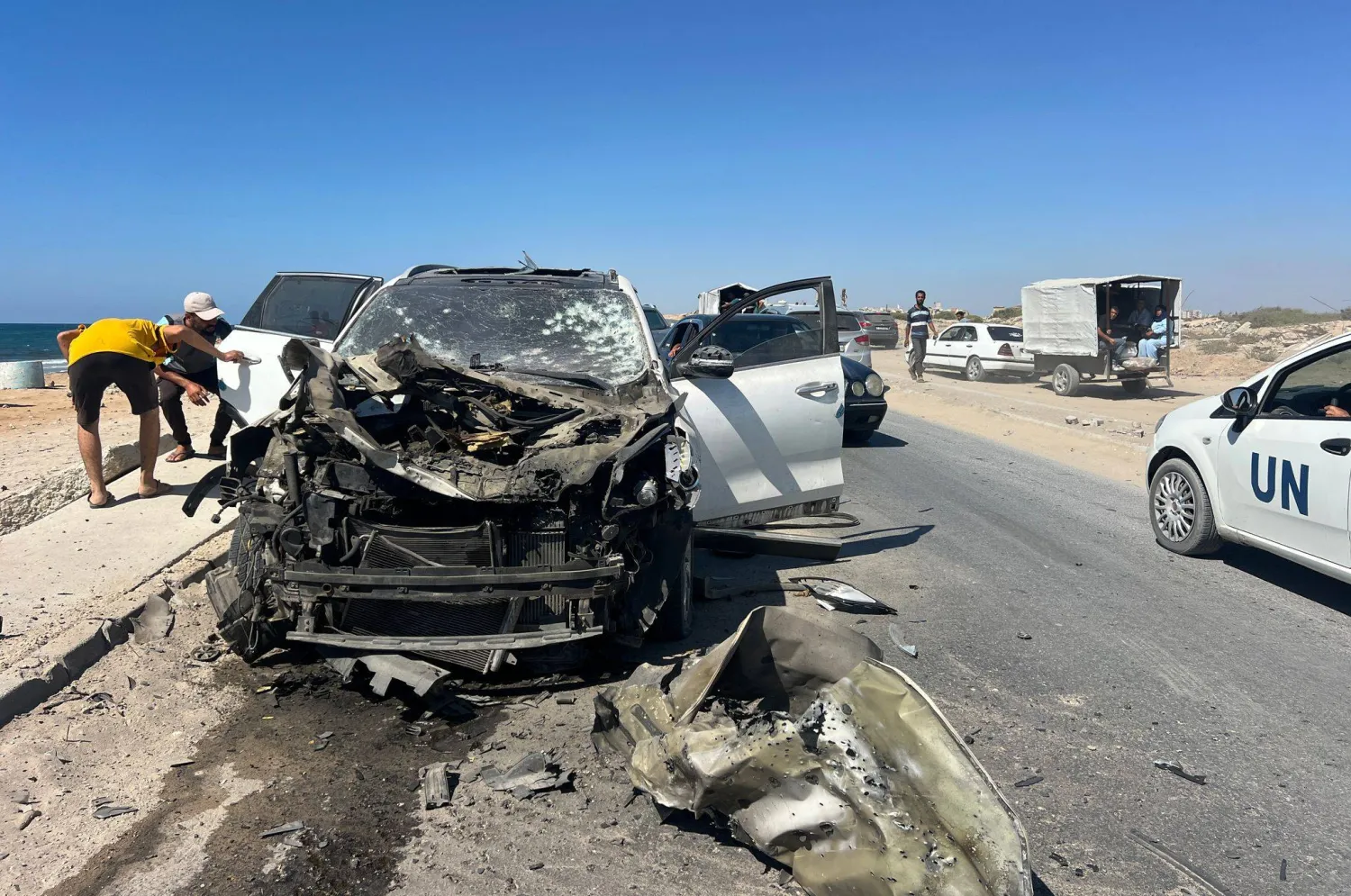 11 July 2026, Palestinian Territories, Nuseirat: A vehicle damaged in an Israeli strike is seen at the scene in the Nuseirat refugee camp in the central Gaza Strip, where a Palestinian was killed and others were wounded. (dpa)