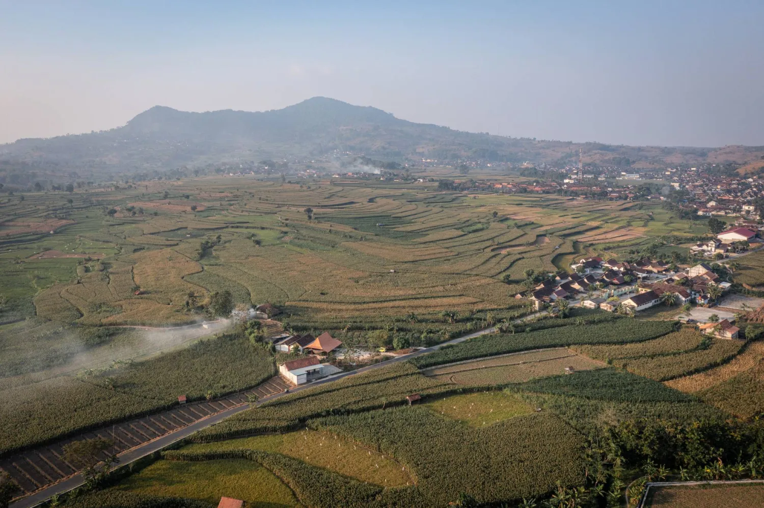 This aerial shot taken using a drone shows a general view of a village in Kendeng Mountains in Rembang, Central Java, Indonesia, Friday, June 19, 2026. (AP Photo/Ibrahim AS)