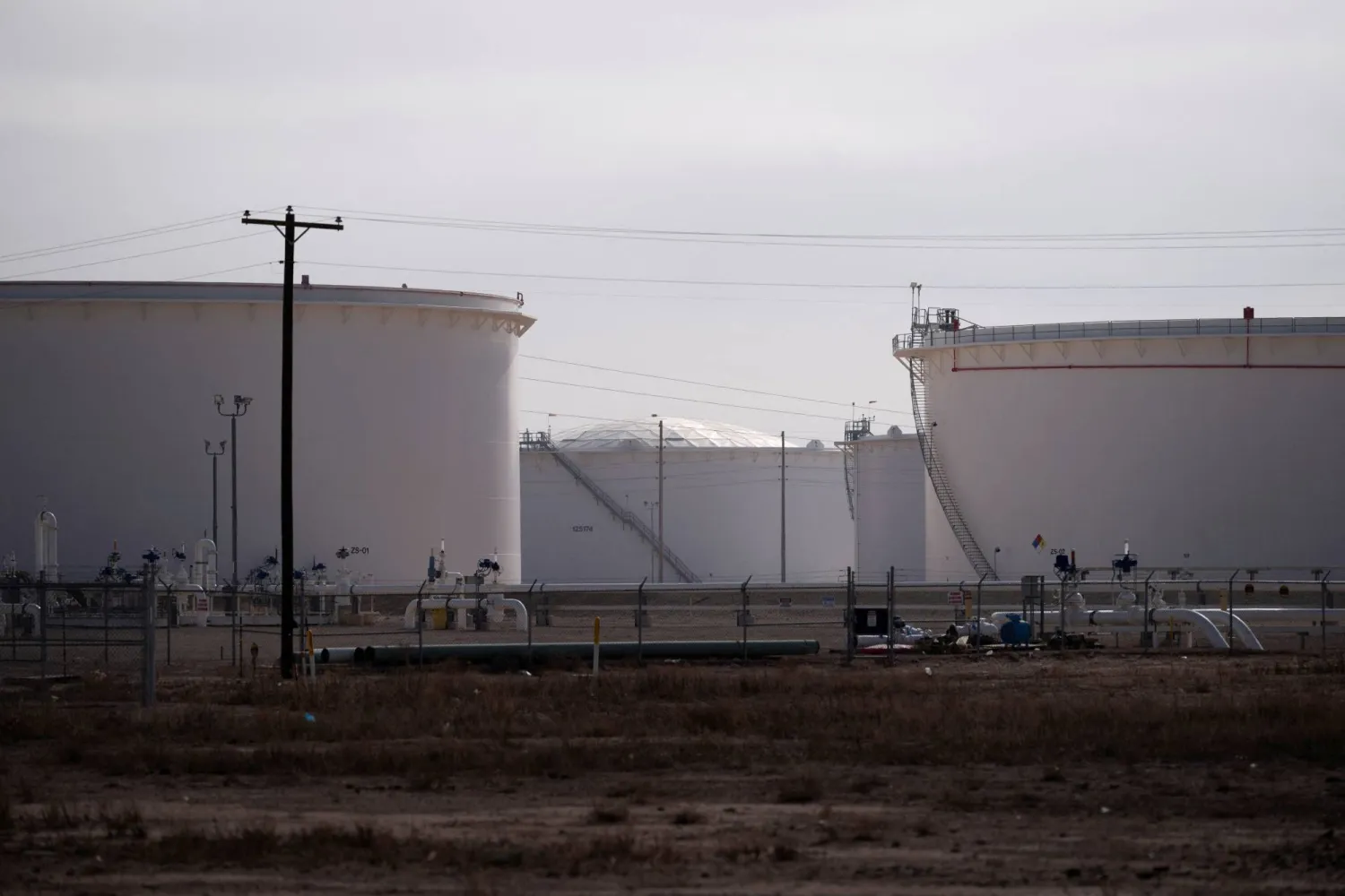 FILE PHOTO: Crude oil storage, a part of the United States' strategic oil reserve, is pictured in the Permian Basin oil field near Midland, Texas, US February 18, 2025.  REUTERS/Eli Hartman/File Photo
