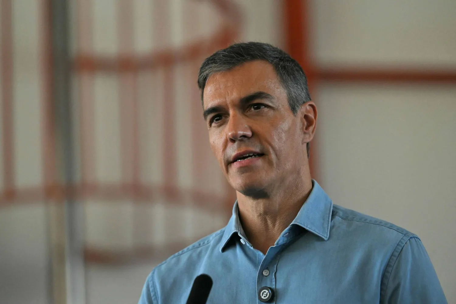 Spain's Prime Minister Pedro Sanchez talks to media during a visit in the area of a wildfire that killed at least 13 people, at the command post set in Turre, Almeria Province, on July 13, 2026. (AFP)